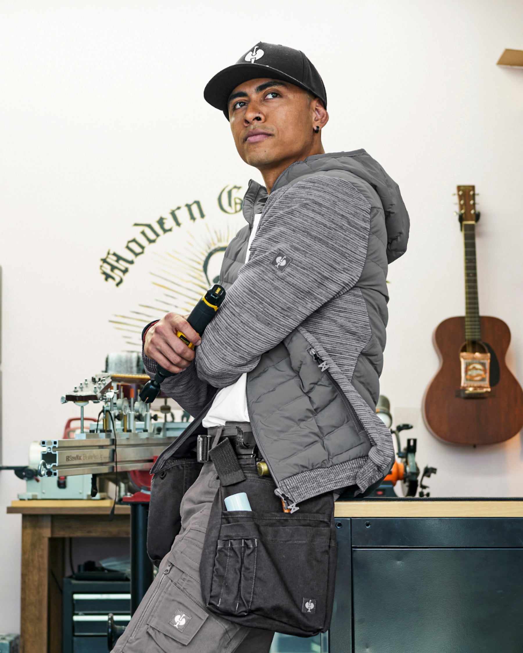 STRAUSS e.s.motion ten hybrid hooded jacket in gray melange shown during outdoor work