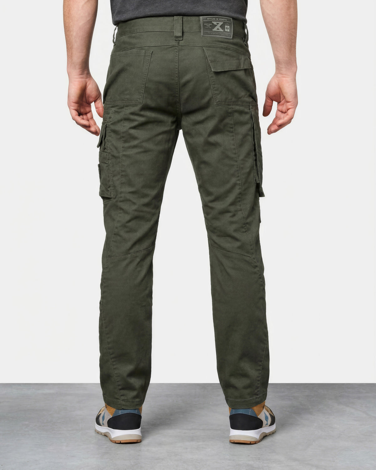 Cargo Work Pants e.s.motion ten in disguise green worn by a model, rear view