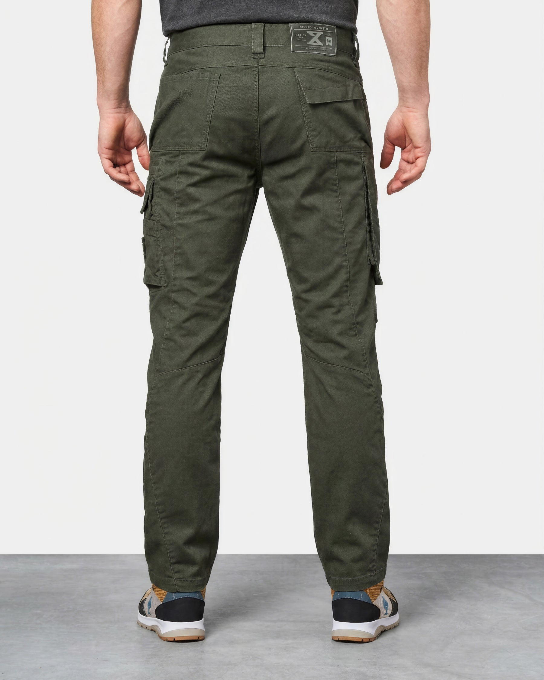 Cargo Work Pants e.s.motion ten in disguise green worn by a model, rear view