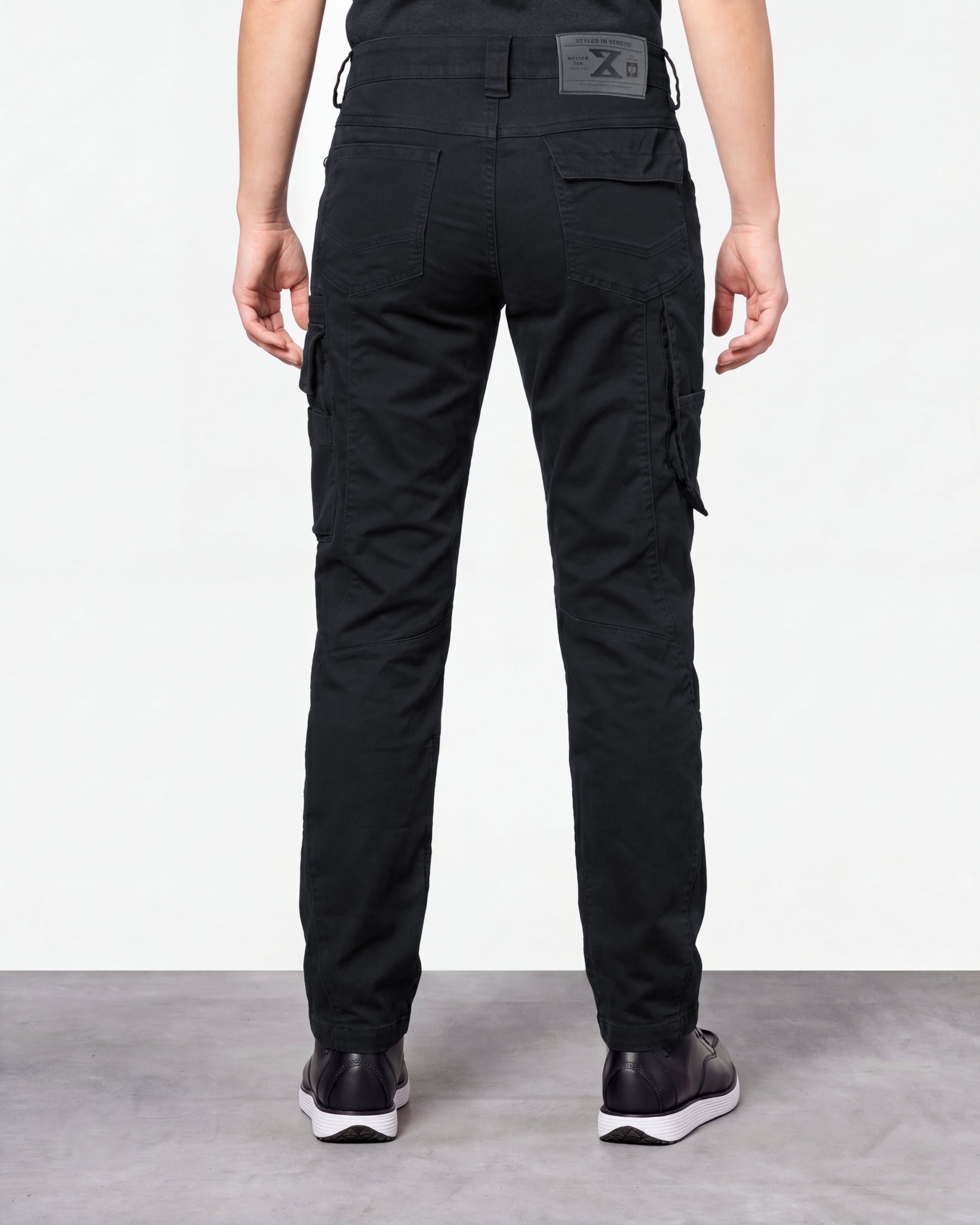 Women's Cargo Work Pants e.s.motion ten in oxid black worn by a model, rear view