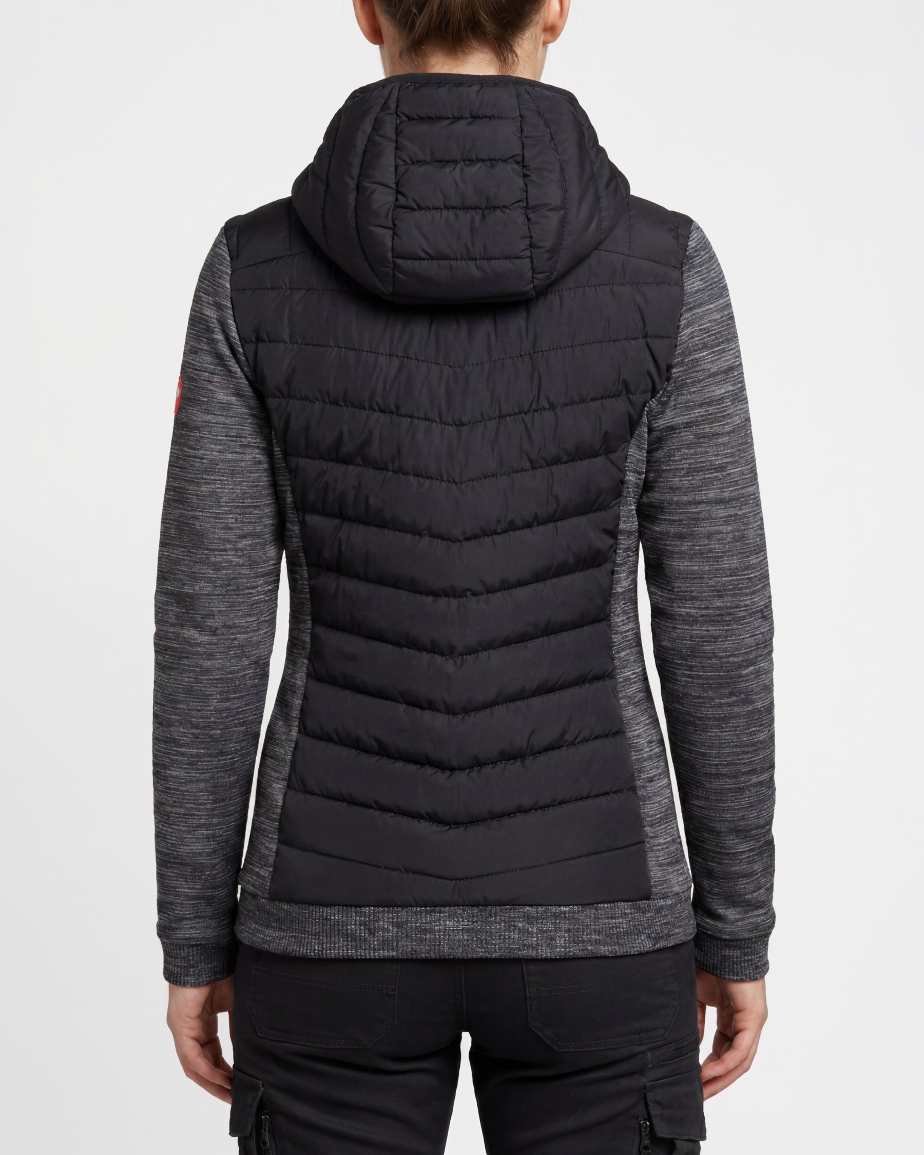 STRAUSS women's e.s.motion ten hybrid hooded jacket in oxid black melange worn, back view