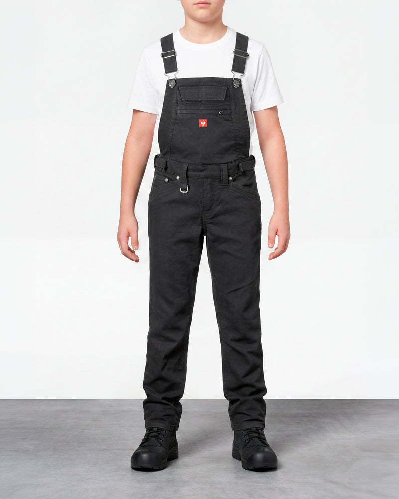black STRAUSS Kids’ Multipocket Bib Overalls e.s.vintage worn by a model, front view