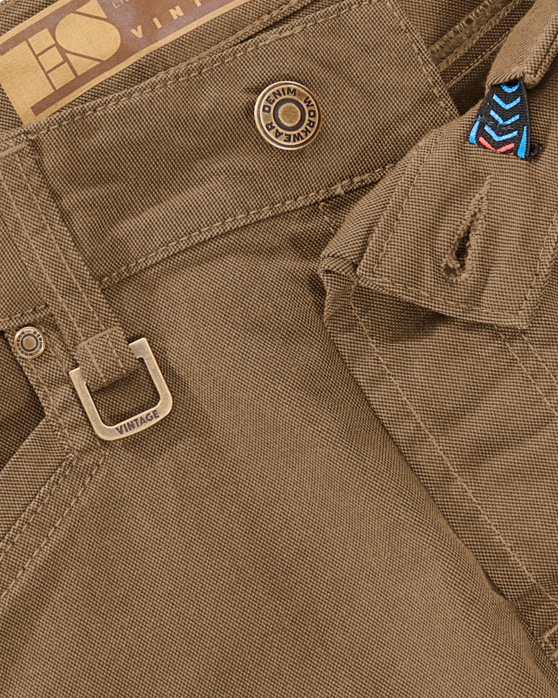 Additional close-up detail of Engelbert Strauss e.s. vintage cargo shorts in sepia, showing fabric texture, stitching, and functional finishing details.