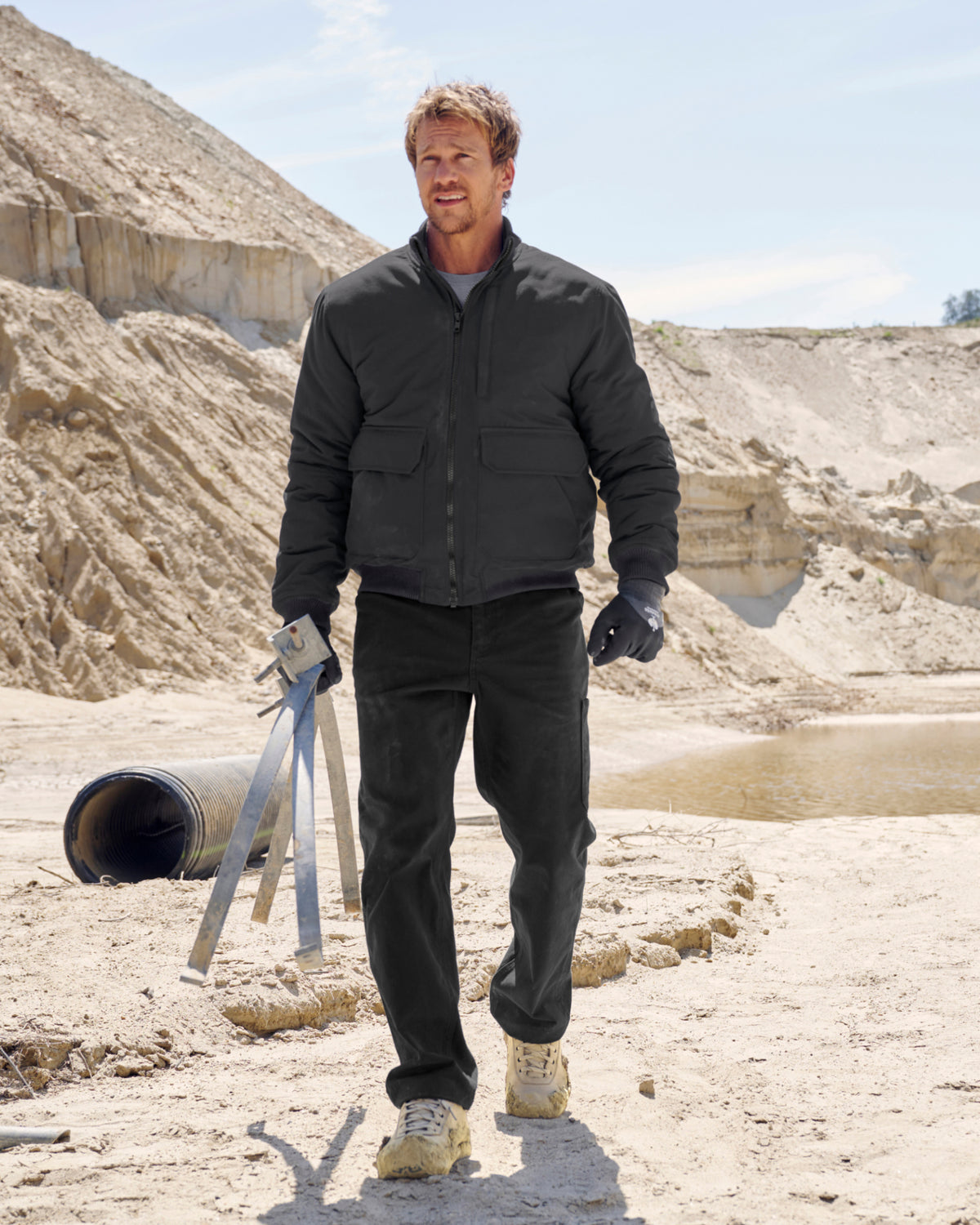STRAUSS e.s.iconic bomber jacket in black shown during outdoor work