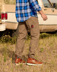 Work Pants e.s.iconic in almond brown worn in a work setting