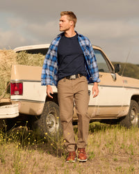 Work Pants e.s.iconic in almond brown in use, showing fit and movement