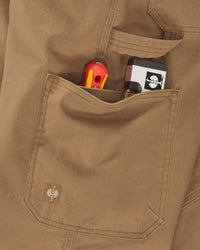 Close-up of pocket and workwear details on Work Pants e.s.iconic in almond brown