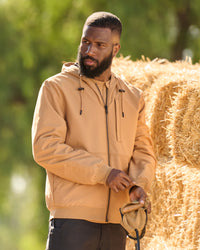 STRAUSS e.s.iconic lightweight jacket in almond brown worn in a work setting