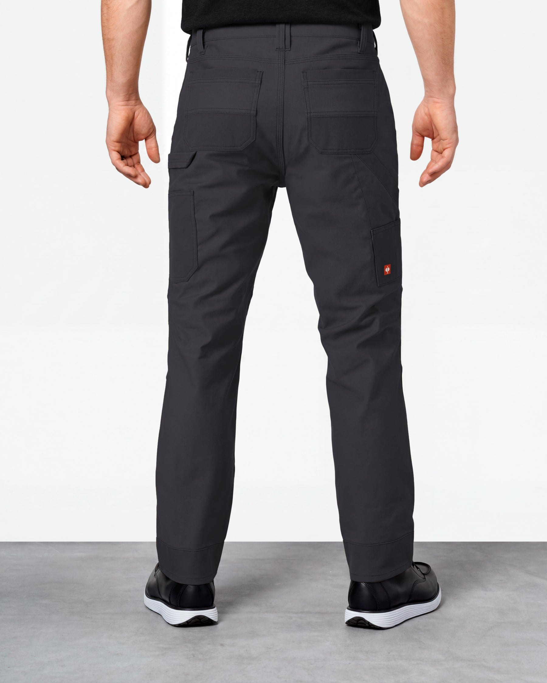 Double Front Work Pants e.s.iconic in black worn by a model, rear view