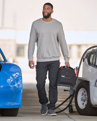 Lifestyle view of Double Front Work Pants e.s.iconic in black during work