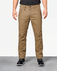 Double Front Work Pants e.s.iconic in almond brown worn by a model, front view