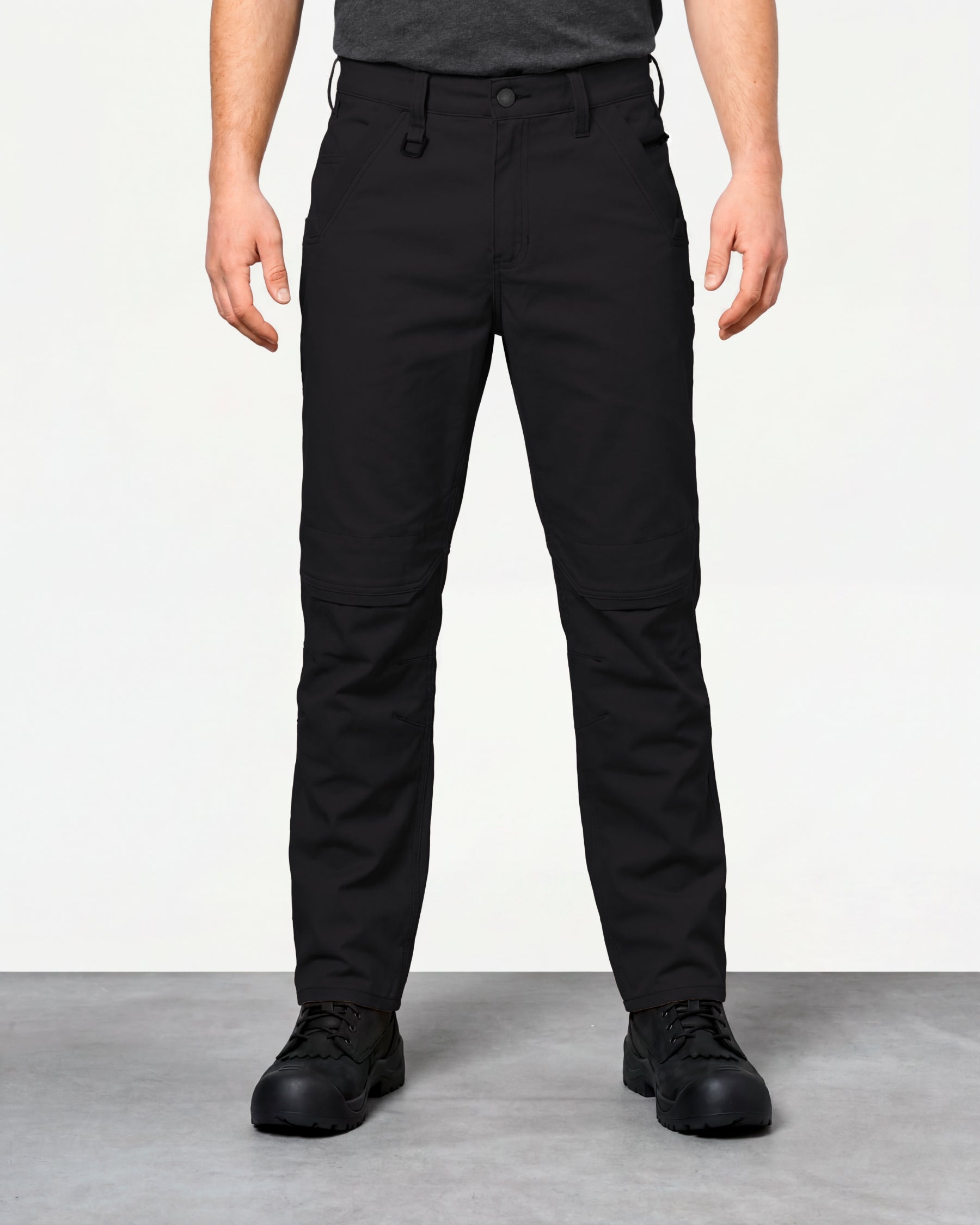 Pocket Protected Work Pants e.s.iconic in black worn by a model, front view