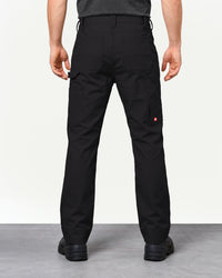 Pocket Protected Work Pants e.s.iconic in black worn by a model, rear view