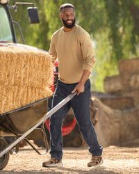 Pocket Protected Work Pants e.s.iconic in black shown in an outdoor workwear setting