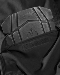 Close-up of knee pad pocket details on Pocket Protected Work Pants e.s.iconic in black