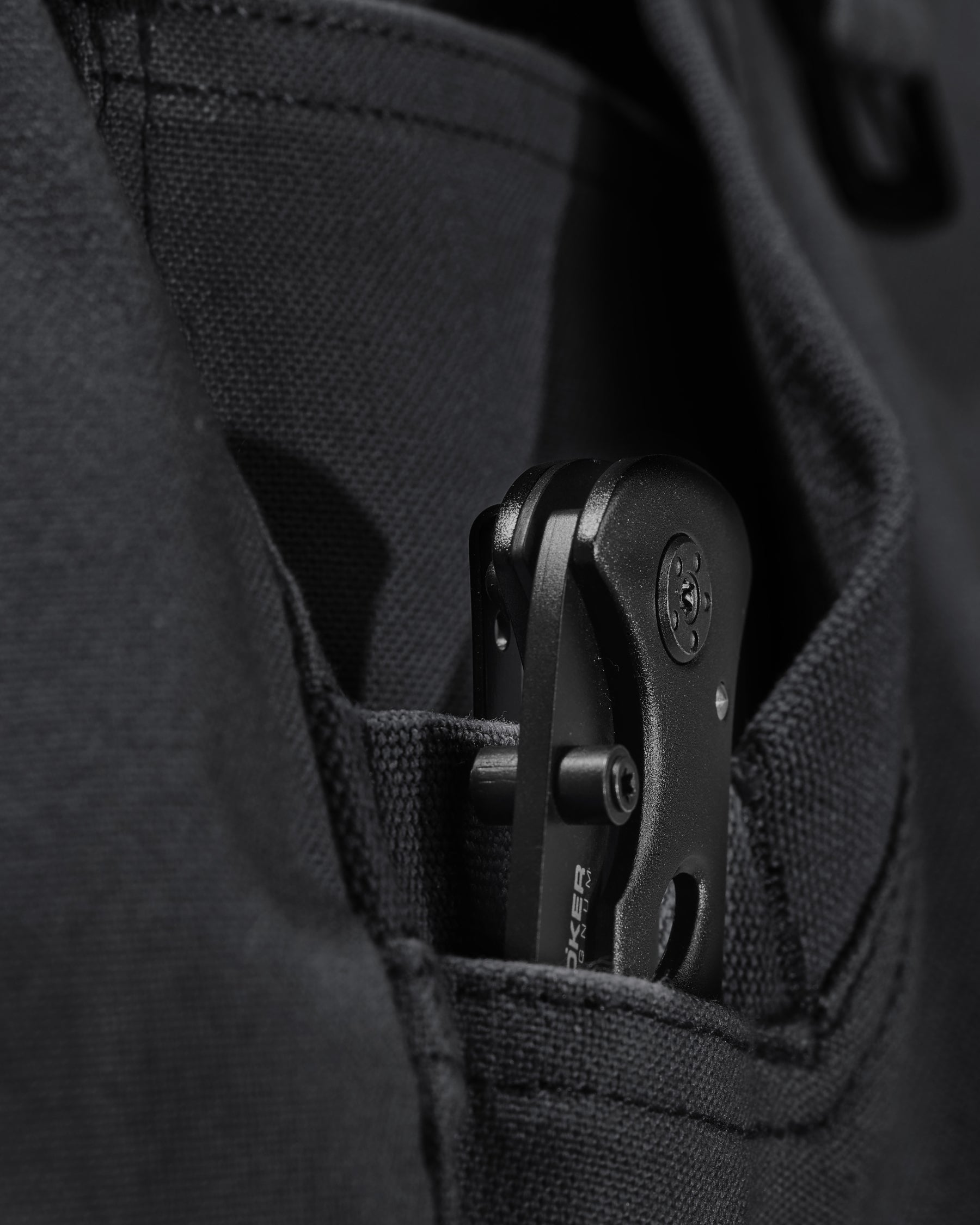 Close-up of fabric and workwear construction on Pocket Protected Work Pants e.s.iconic in black