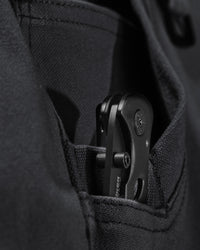 Close-up of fabric and workwear construction on Pocket Protected Work Pants e.s.iconic in black
