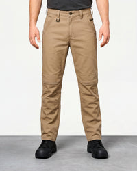 Pocket Protected Work Pants e.s.iconic in almond brown worn by a model, front view