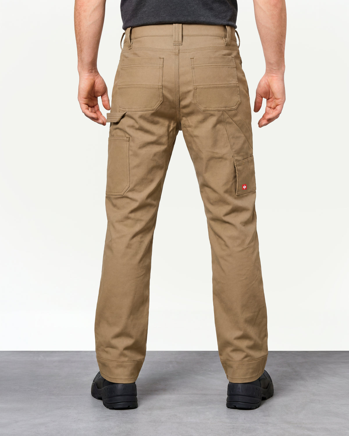Pocket Protected Work Pants e.s.iconic in almond brown worn by a model, rear view