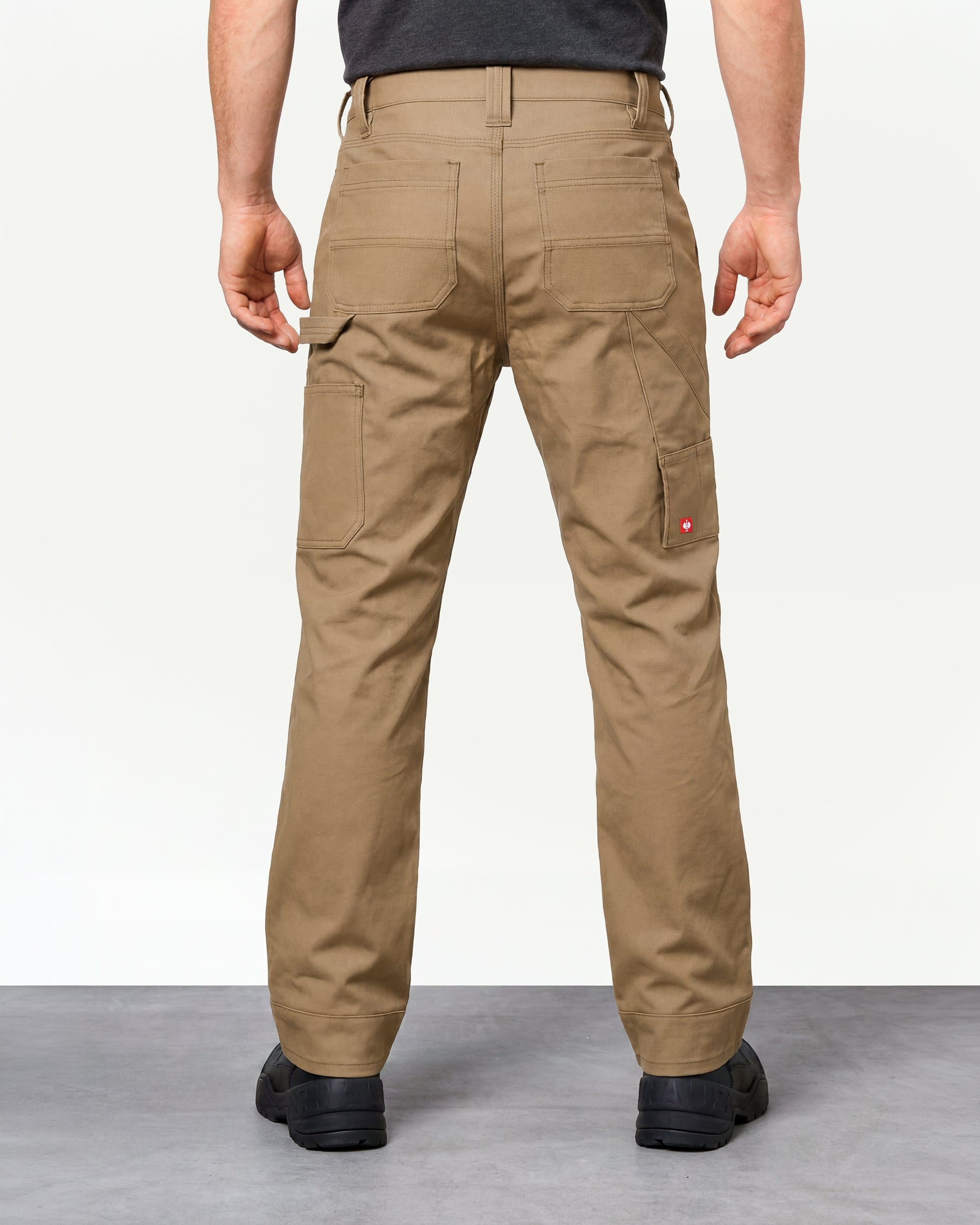 Pocket Protected Work Pants e.s.iconic in almond brown worn by a model, rear view