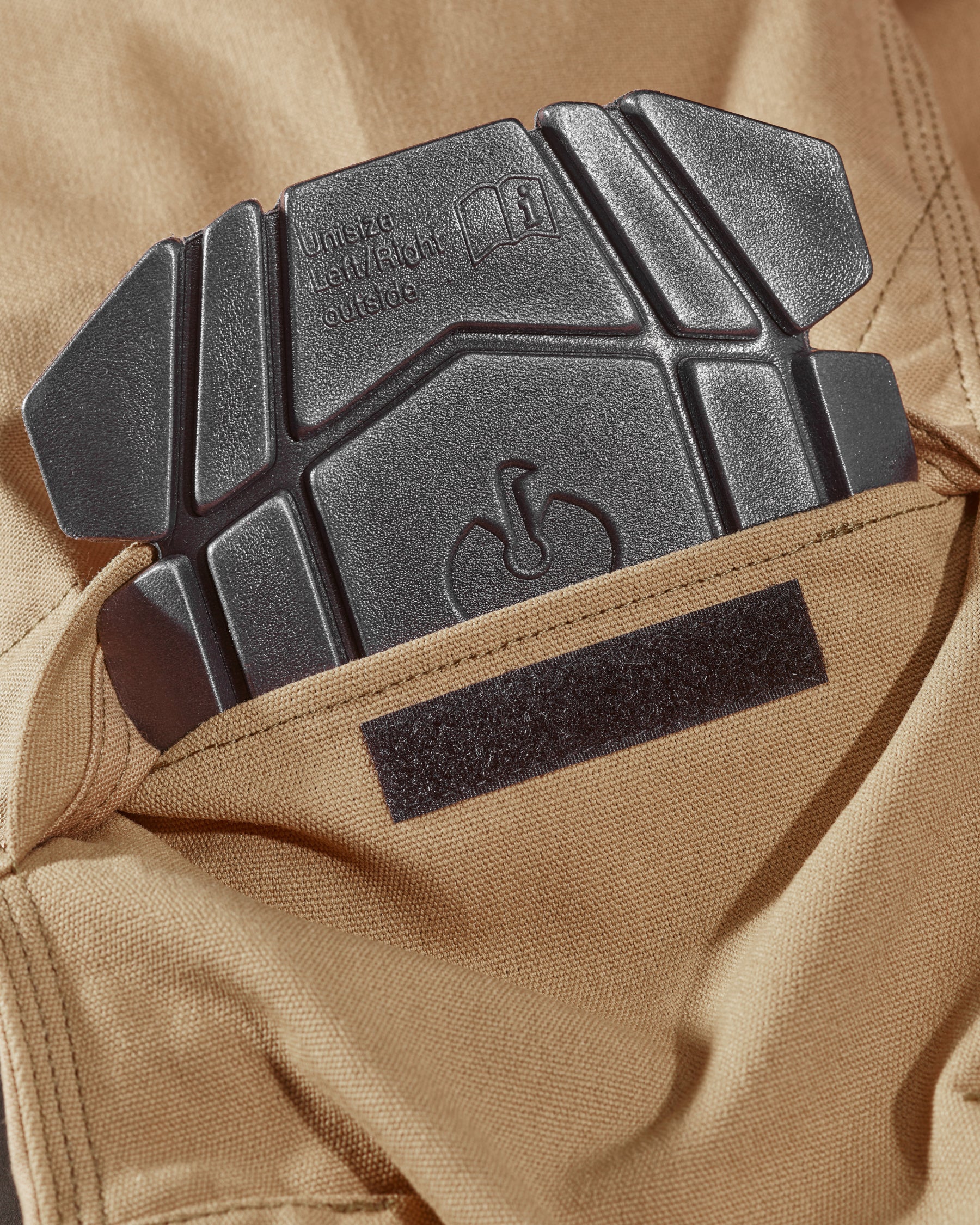 Close-up of knee pad pocket details on Pocket Protected Work Pants e.s.iconic in almond brown