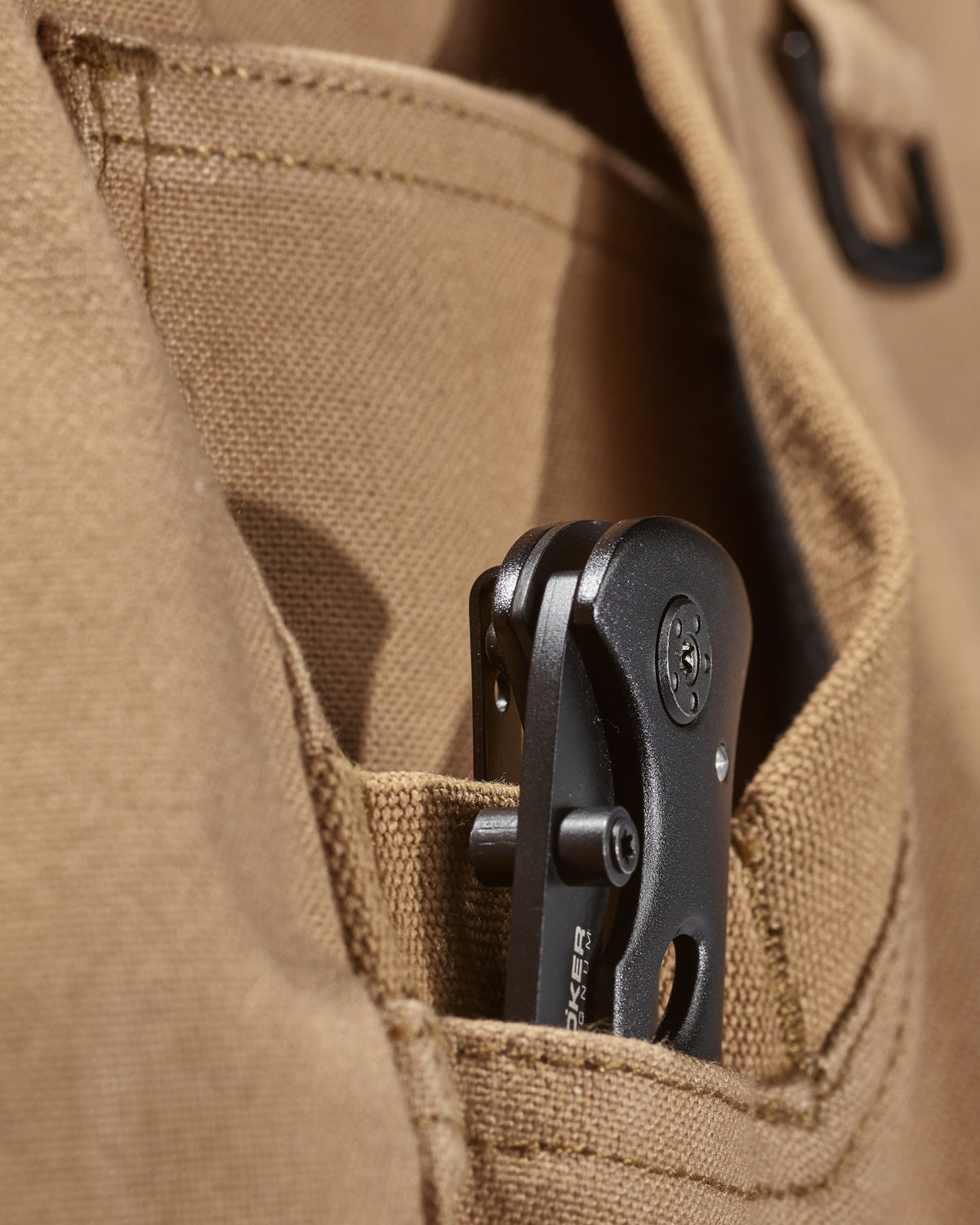 Close-up of fabric and workwear construction on Pocket Protected Work Pants e.s.iconic in almond brown