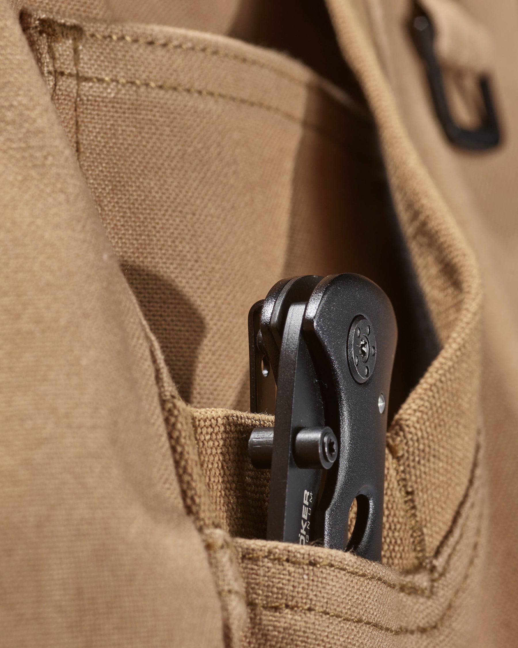 Close-up of fabric and workwear construction on Pocket Protected Work Pants e.s.iconic in almond brown