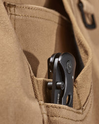 Close-up of fabric and workwear construction on Pocket Protected Work Pants e.s.iconic in almond brown