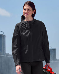 STRAUSS women's e.s.trail light pack windbreaker in black worn in a work setting