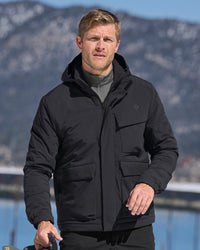 STRAUSS e.s.trail winter jacket in black shown during outdoor winter work