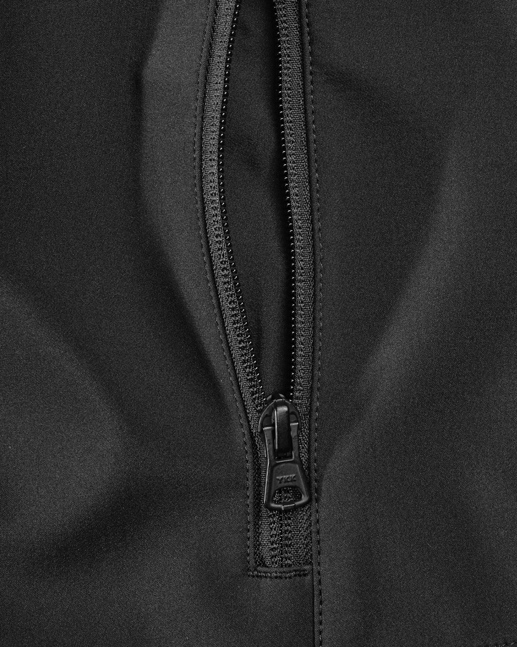 Close-up of pocket and hood details on STRAUSS e.s.trail pure softshell jacket in black