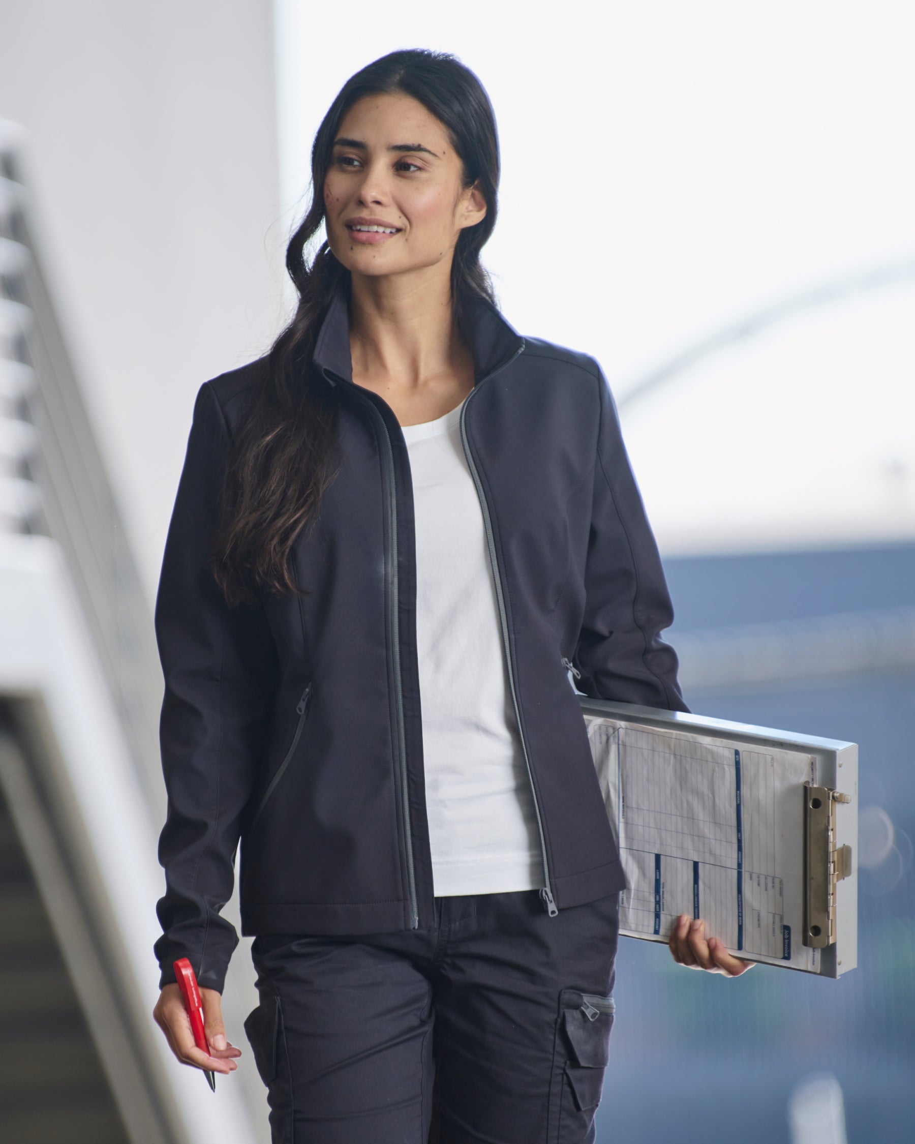 STRAUSS women's e.s.trail pure softshell jacket in black worn in a work setting