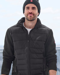 STRAUSS e.s.trail pure hybrid jacket in black shown during outdoor work