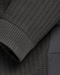 Close-up of zipper and pocket details on STRAUSS e.s.trail pure hybrid jacket in black