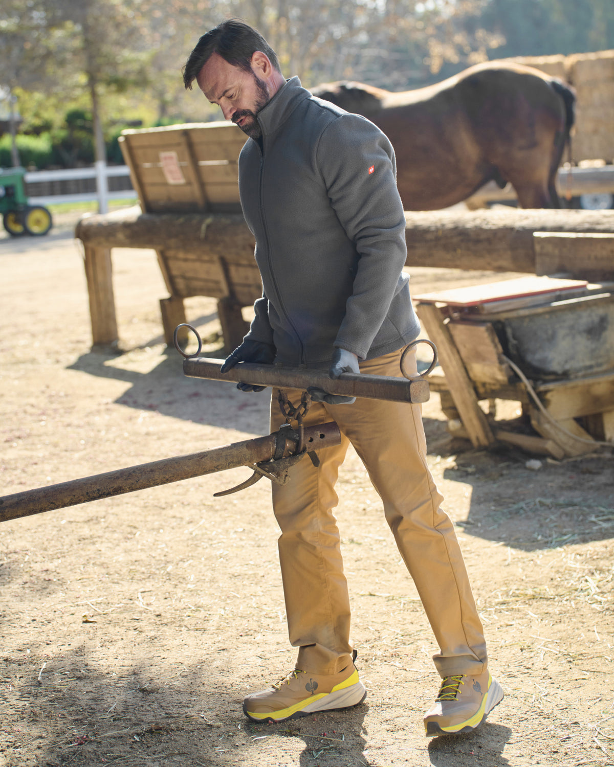 STRAUSS full-zip fleece jacket in carbon gray shown during outdoor work