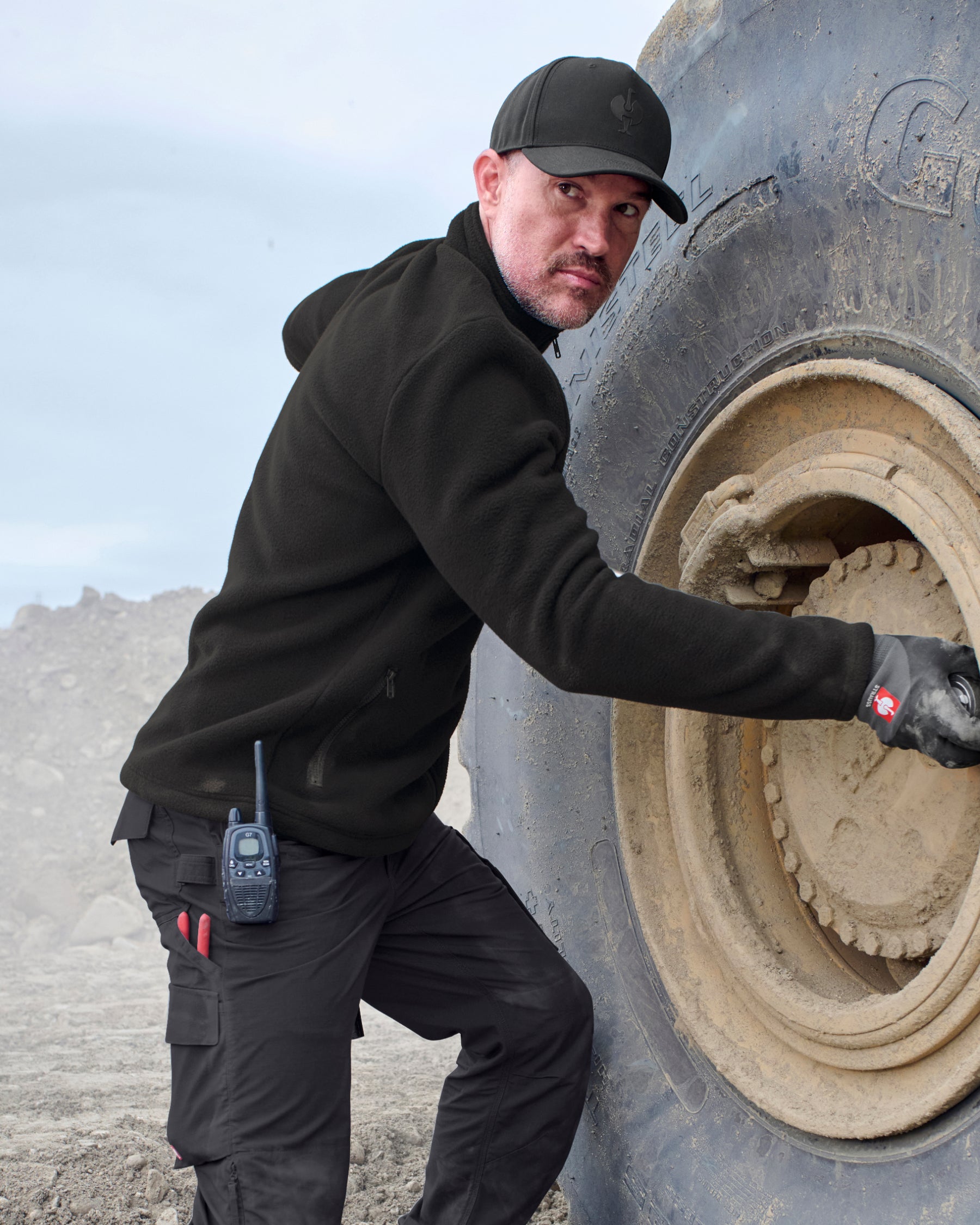 STRAUSS full-zip fleece jacket in black in use on the job