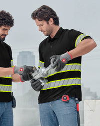 A worker in STRAUSS workwear uses black and gray evertouch winter nitrile foam gloves while handling jobsite materials.