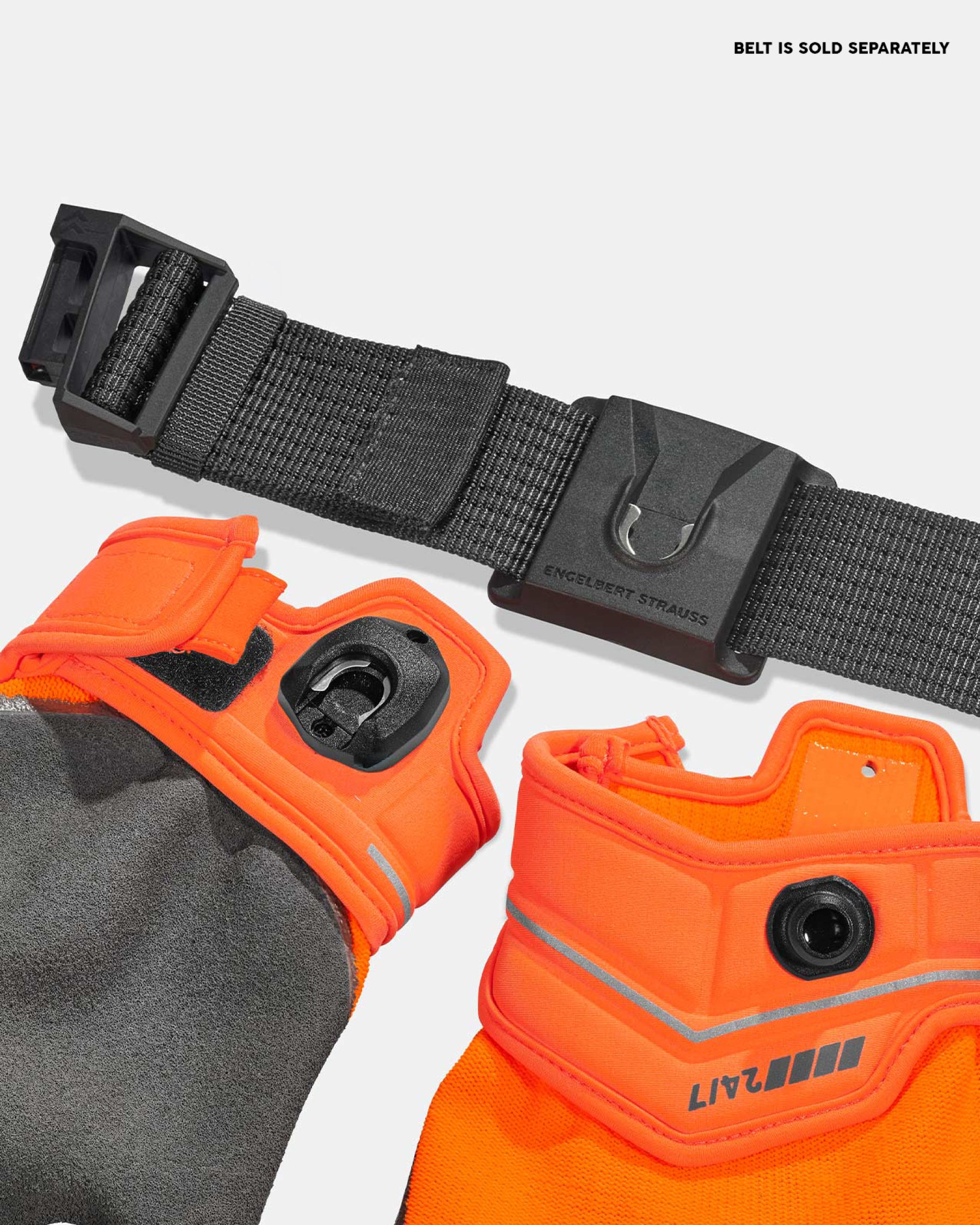 Close-up of the palm grip, fingers, and cuff on the neon orange and anthracite STRAUSS e.s.motion 24/7 hybrid gloves.