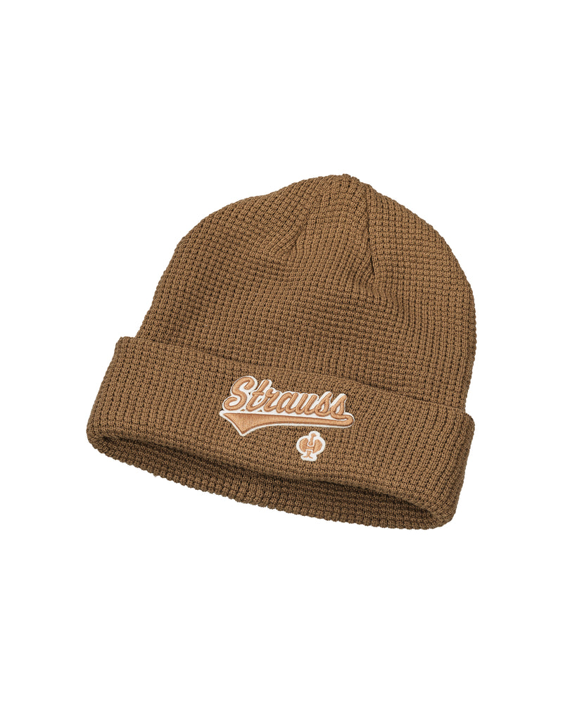 Almond brown STRAUSS e.s.e:pic beanie with a ribbed knit texture.