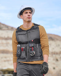STRAUSS e.s.iconic tool vest in carbon gray and black worn in a work setting