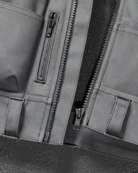 Close-up of tool pockets and storage details on STRAUSS e.s.iconic tool vest in carbon gray and black