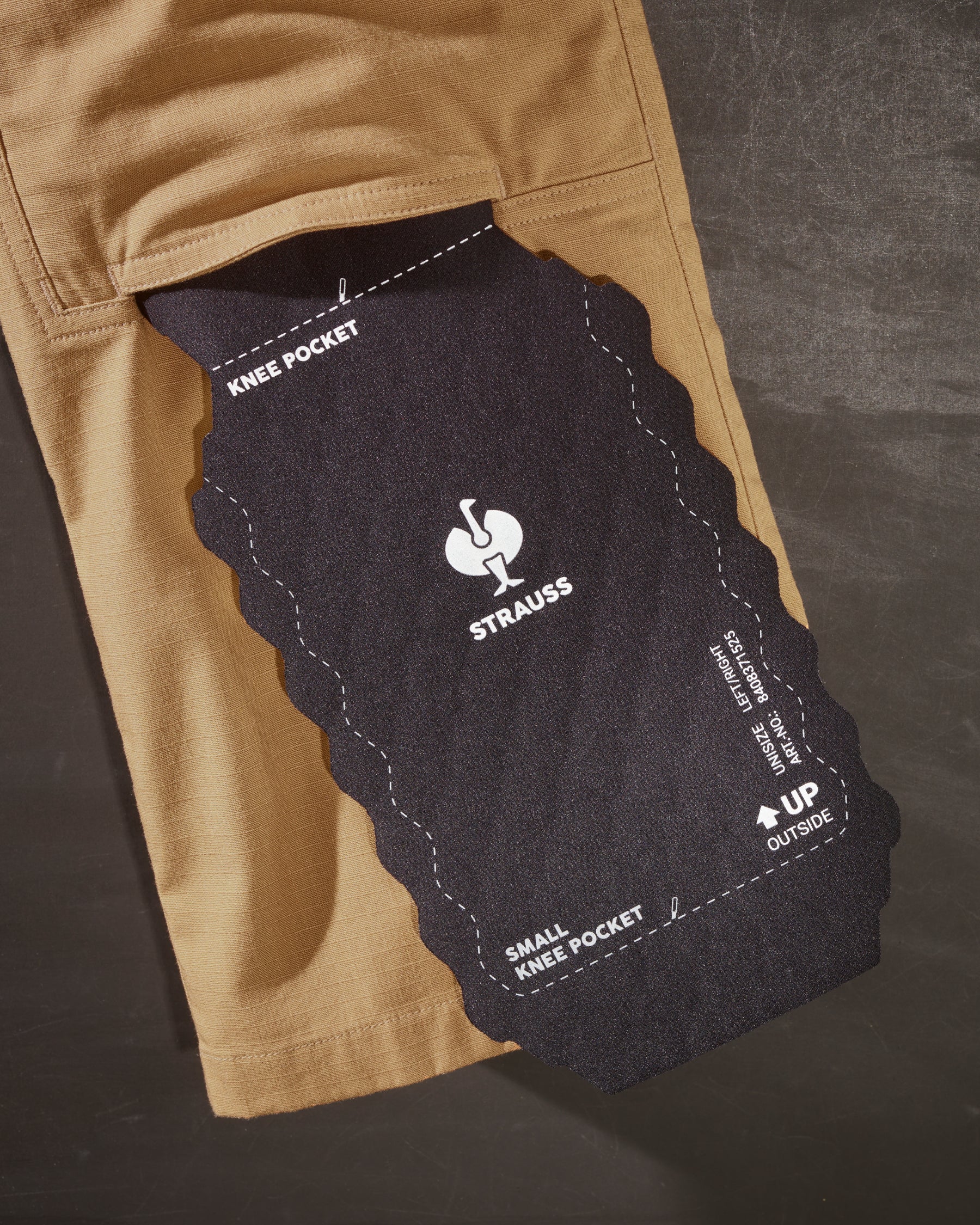 Close-up of the contoured cushioning and flexible shape on the graphite STRAUSS comfort cell knee pads.