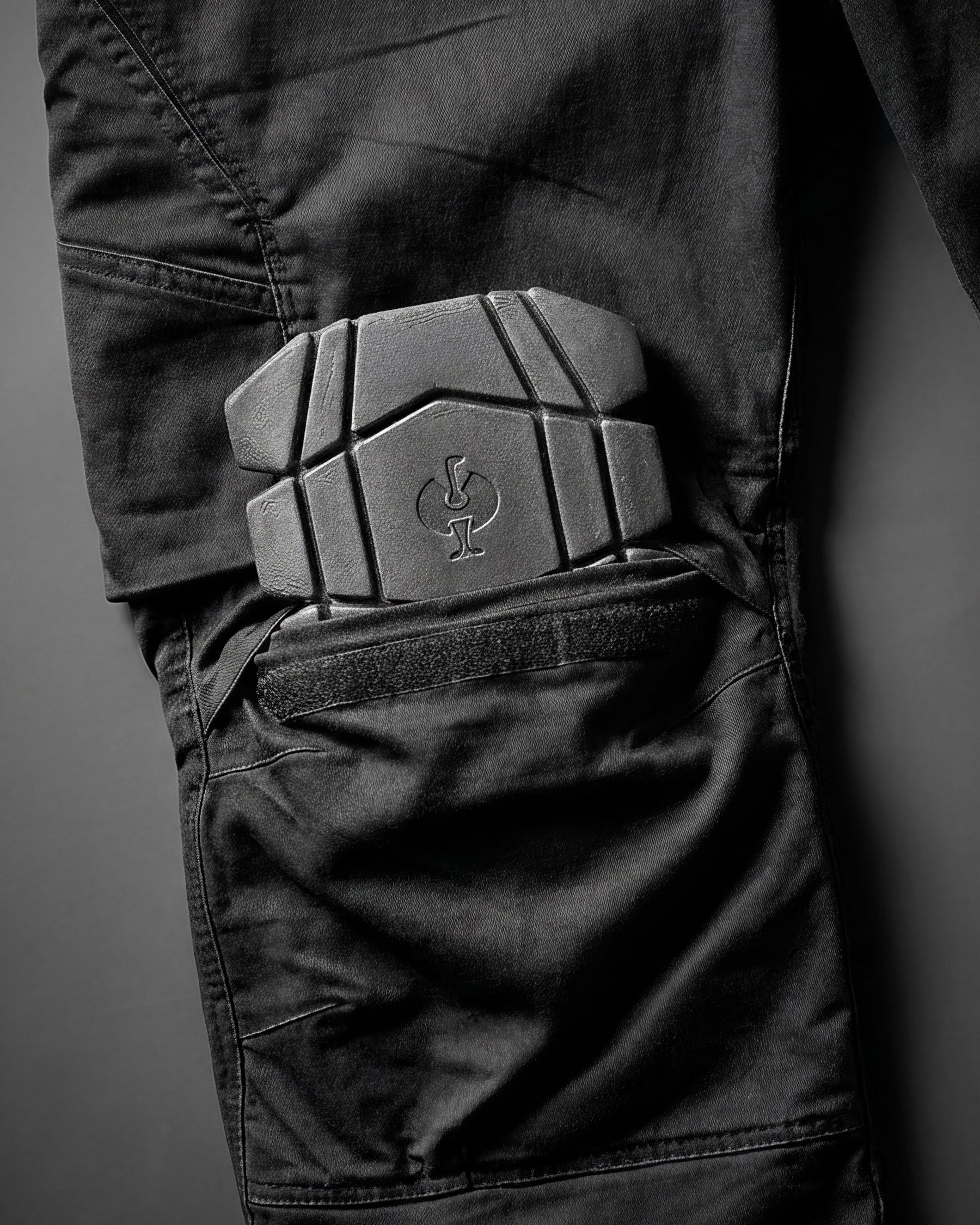 Close-up of the contoured cushioning and flexible shape on the graphite STRAUSS women's ergonomic knee pads.