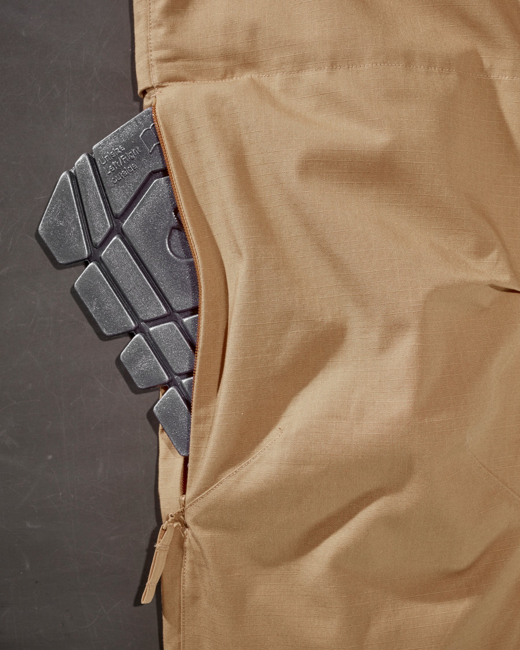 Close-up of the surface texture and ergonomic profile on the graphite STRAUSS women's ergonomic knee pads.