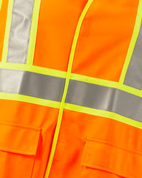 Close-up of reflective striping and shell details on STRAUSS high visibility vest in neon orange