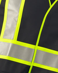 Close-up of reflective striping and shell details on STRAUSS enhanced visibility vest in black