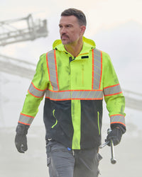 STRAUSS Class 2 high visibility waterproof jacket in neon yellow and black shown on an outdoor jobsite