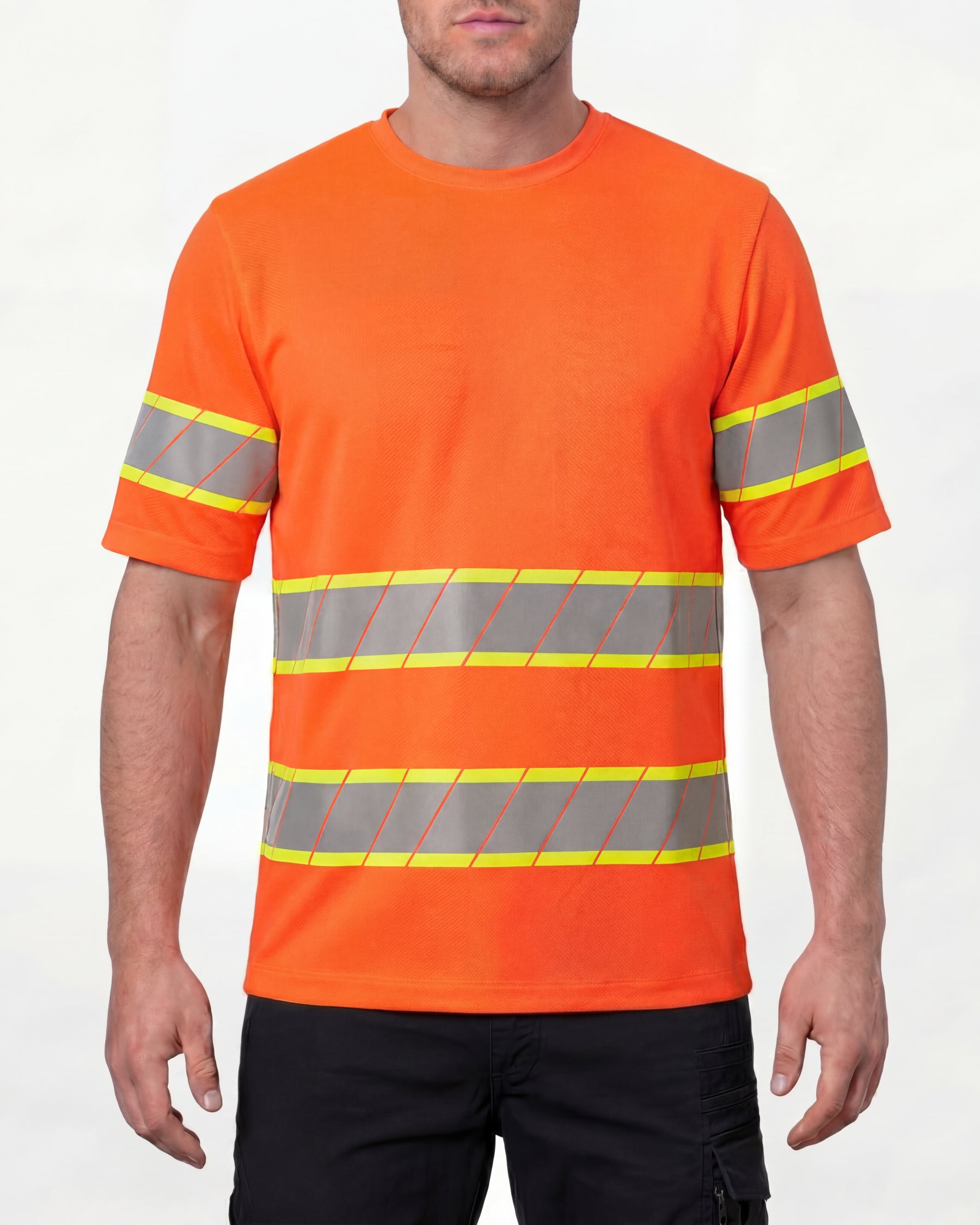 A model wears the STRAUSS Class 2 High Visibility T-Shirt in neon orange with dark work pants and work boots in a studio product scene