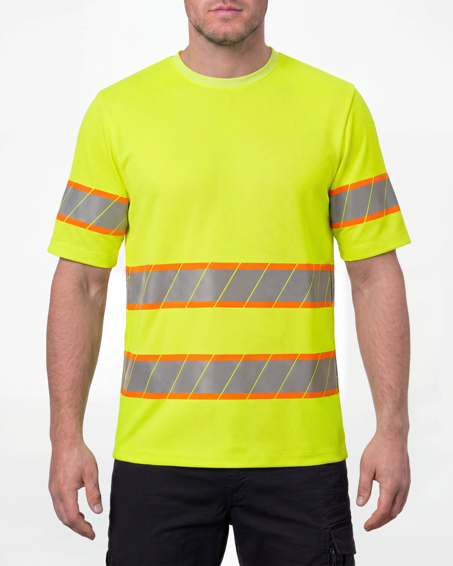 A model wears the STRAUSS Class 2 High Visibility T-Shirt in neon yellow with dark work pants and work boots in a studio product scene