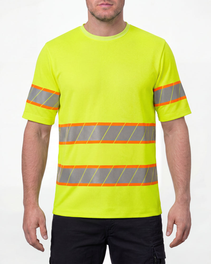 A model wears the STRAUSS Class 2 High Visibility T-Shirt in neon yellow with dark work pants and work boots in a studio product scene